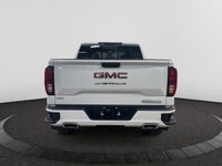 Welcome to Capital GMC! This 2026 GMC Sierra 1500 in Summit White is equipped with 4WD and Gas V8 5.... (image 3)