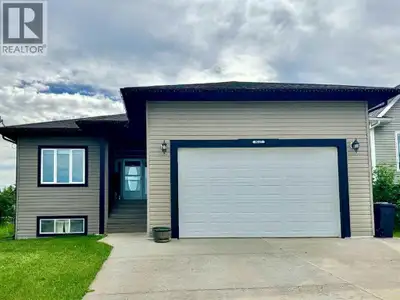 This 1,350 sq. ft. raised bungalow offers a bright, open-concept main floor with the kitchen, dining...