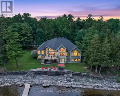 THIS EXCEPTIONAL WATERFRONT BUNGALOW offers 143 ft of prime Ottawa River frontage, wider than many n...
