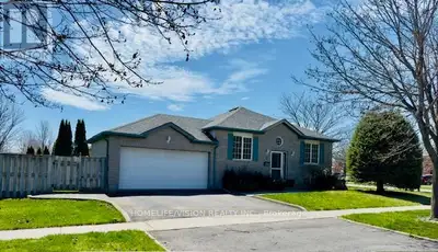 Welcome to 1105 Tillison Avenue, a beautifully maintained 4-bedroom all-brick raised bungalow offeri...