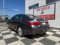 a refined midsize sedan. As an upper-tier trim, it features a leather-trimmed interior, heated front... (image 5)