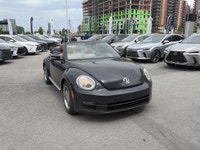 La Volkswagen Beetle 2016 est une voiture compacte emblématique qui allie le style légendaire de la... (image 2)