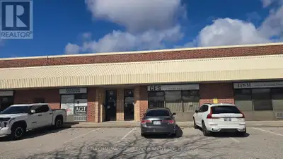 Clean and functional 2,415 SF industrial unit featuring 16' clear ceiling height and truck level shi...