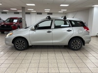 Silver light glances off the Titanium Metallic paint as it moves, the compact hatchback shape cuttin... (image 2)