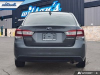 Come see this certified 2021 Subaru Impreza Touring AWD | 5-Speed Manual | Heated Seats | Alloy Whee... (image 3)