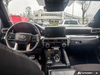 This Toyota Tacoma boasts a Intercooled Turbo Regular Unleaded I-4 2.4 L/146 engine powering this Au... (image 9)