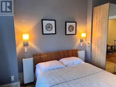 Across The Street From The Park In Kensington Is This Fabulous And Modern Main Floor Apartment.Gas S...