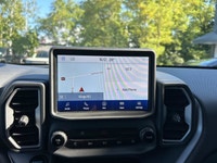 The 2023 Ford Bronco Sport Big Bend in a striking gray finish is an adventure-ready SUV with a power... (image 8)