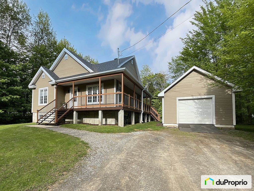 $690,000 - Bungalow for sale in Ste-Sophie — photo 1