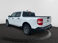 Check out this vehicle's pictures, features, options and specs, and let us know if you have any ques... (image 2)