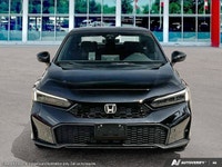 The 2026 Honda Civic Sedan Hybrid Sport Touring features an integrated navigation system to guide ev... (image 1)
