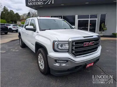 2018 GMC Sierra 1500 SLE Summit White Odometer is 72317 kilometers below market average! SLE 4WD 6-S...