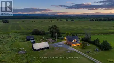 Welcome to this beautifully renovated all-brick vintage farmhouse that sits on an impressive 2.5-acr...