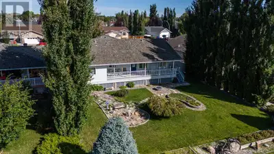 **A Dream Home for the Whole Family – Backing Onto The Bridges at Claresholm Golf Course**Welcome to...