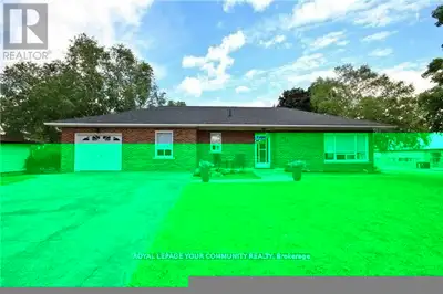 Beautiful 3 bedroom plus 1 bedroom apt, all brick bungalow on large 125 x 100 corner-lot (key lot)....