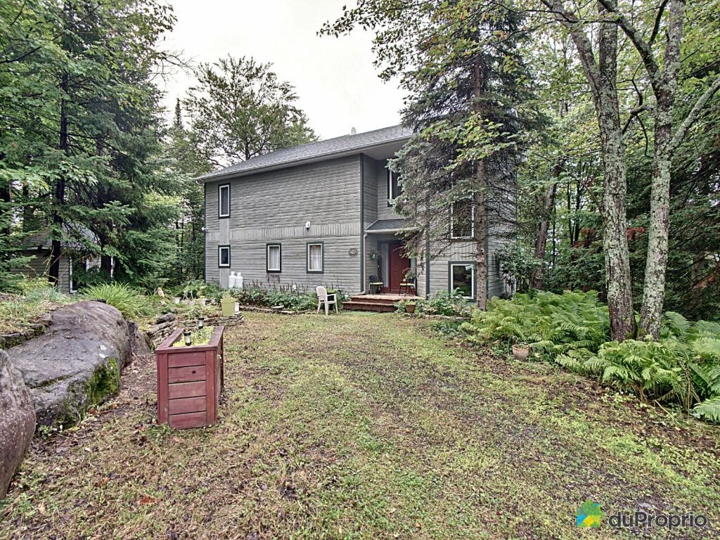 $750,000 - 2 Storey for sale in Ste-Adele — photo 1