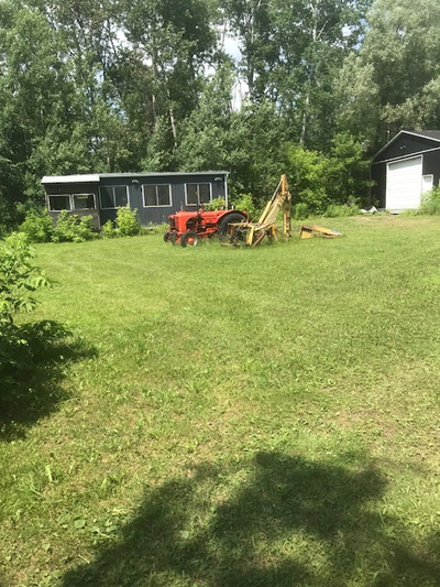 Great location two km from Barrie Town Line 24x32 portable was used as office also has 30x40 buildin...