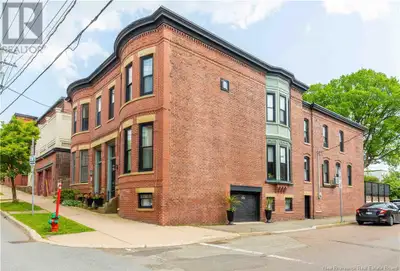 This beautifully restored Queen Anne Revival home, built in 1894, blends historical charm with moder...