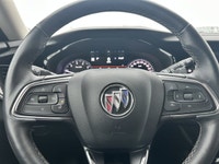 The 2023 Buick Envision Essence, presented in a sophisticated Gray finish, masterfully blends luxuri... (image 7)