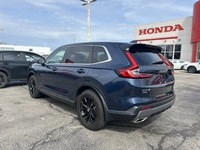 The 2024 Honda CR-V Hybrid EX-L in stunning Canyon River Blue Metallic offers an unparalleled blend... (image 6)