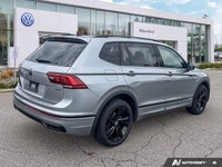 The 2024 Volkswagen Tiguan Comfortline R-Line Black Edition elevates every journey with its distinct... (image 4)