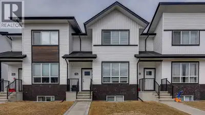 Step into modern living with this stylish 2-Storey townhome in the desirable community of Evergreen....