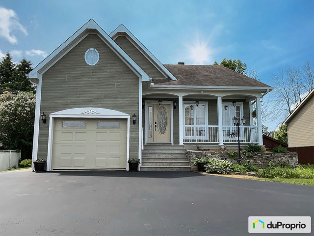 $775,000 - Bungalow for sale in Grenville-sur-la-Rouge — photo 1