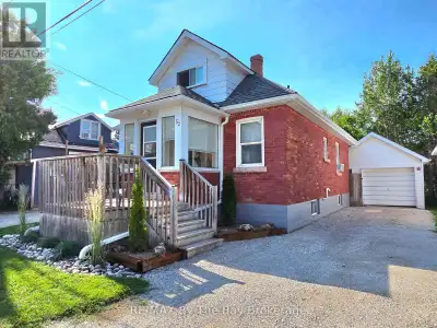 Welcome to 52 Berry Street, right in the heart of Town. This home features a bright, open-concept li...