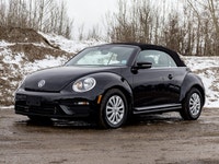 This Volkswagen blends iconic design with open-air driving fun. This vehicle has no reported acciden... (image 4)
