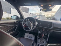 This Volkswagen Jetta GLI boasts a Intercooled Turbo Premium Unleaded I-4 2.0 L/121 engine powering... (image 8)