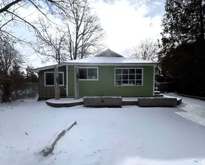 Step into cozy cottage living with this charming, fully furnished two-bedroom home offering vintage...