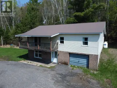 Barry's Bay. Spacious 2-storey, 3-bedroom family home situated on 14 acres . Set on a hillside with...