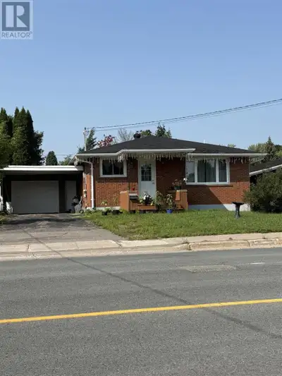 Welcome to this solid brick bungalow offering comfort, convenience, and plenty of potential. Ideally...