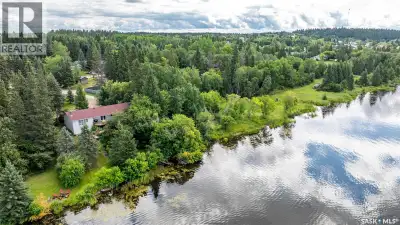 Now offered as one expansive waterfront property, combining the home lot, adjoining shop lot and add...