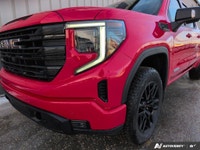 Experience the all-new 2026 GMC Sierra 1500 Elevation in a striking Red finish, boasting a robust 44... (image 8)