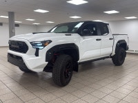 The latest 2025 Toyota Tacoma Hybrid brings meaningful refinement to Toyotas midsize pickup formula,... (image 1)