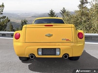 Commanding presence meets open-air freedom in this stunning Slingshot Yellow 2004 Chevrolet SSR LS,... (image 3)