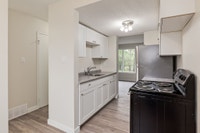 Amenities: In-suite Laundry • Private Yard • Spacious Rooms Suite & Building: Spacious two-bedroom,... (image 1)