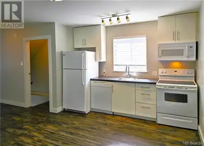 Discover the perfect blend of modern living and historic charm with this two-story condo, nestled in...
