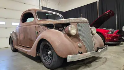 1936 Ford Model 48 3-window coupe. Incredible build sitting on a fully boxed custom Roadster Shop Ch...