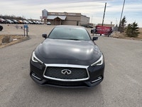 The 2017 Infiniti Q60 Premium is a luxurious 2-door coupe, often featuring a 300-horsepower 3.0L twi... (image 3)