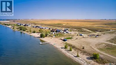 Canal lot for sale in Sunset Acres Resort on the East shore of Last Mountain Lake. This waterfront l...