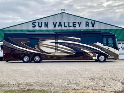 Gorgeous one owner low mileage Entegra Coach Insignia! 4 Slide outs, bath and a half, heated porcela...