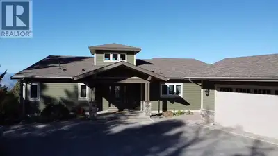 Experience refined country living in this captivating custom-built estate, where exceptional craftsm...