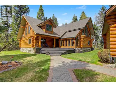 Exceptional executive log home set on 1.98 acres along the Nechako River shores. With just under 600...