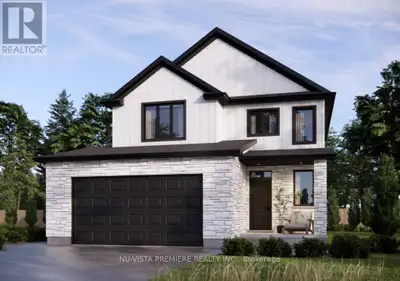 EXTRA WIDE LOT! The Angela model with 1987 sq ft of Luxury finished area located on quiet street in...