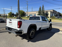 This vehicle is equipped with: 6.6L 8 Cylinder Gas Engine 4Wheel Drive Long Box Heated Steering Whee... (image 4)