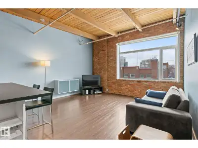 Historic Downtown Loft in the Iconic John Deere Warehouse! Experience the perfect mix of industrial...