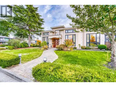 Located in prestigious Sunnymede -"Sunny District" of central Richmond, this European-inspired custo...