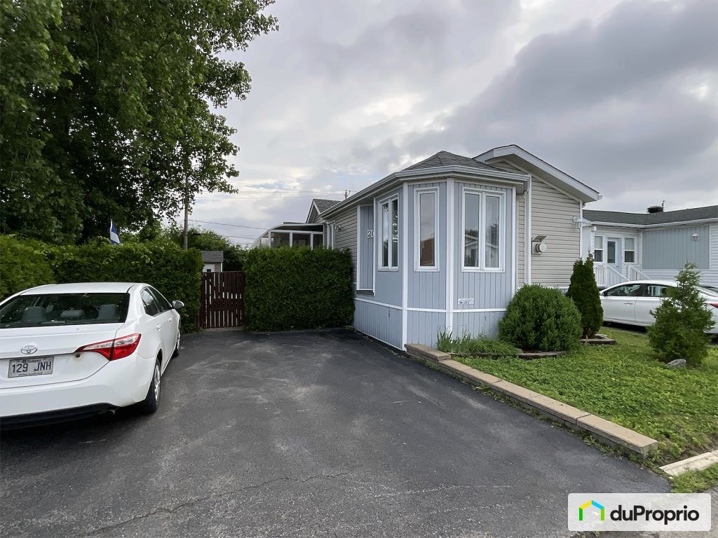 $299,500 - Manufactured home for sale in Fabreville — photo 1